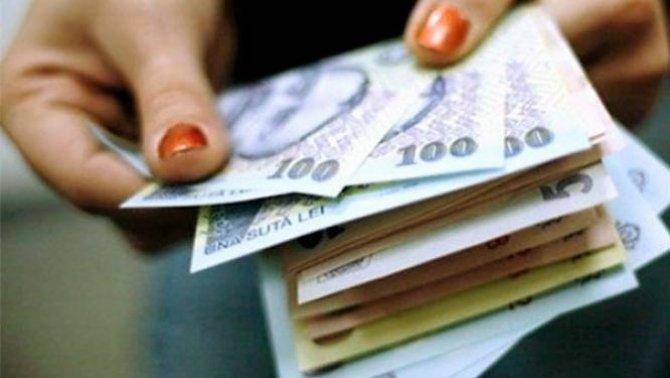 Vesti bune pentru romani. Salariul minim pe economie crește cu un nivel care să depășească rata inflației